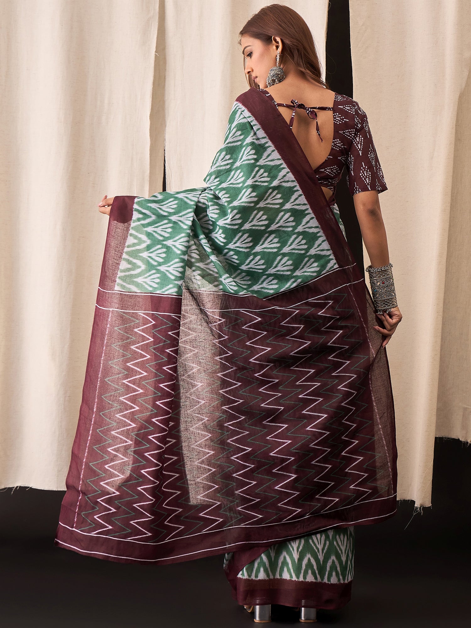 Green & Maroon Cotton Saree with Ikat-Inspired White Buta Motifs