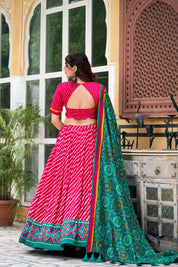 Pink Tussar Silk Lehenga Choli with Leheriya With Patola Print Border