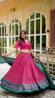 Pink Tussar Silk Lehenga Choli with Leheriya With Patola Print Border